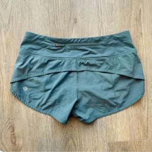 green speed up shorts